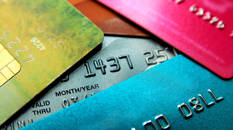 Pile of credit cards overcharged during the holidays
