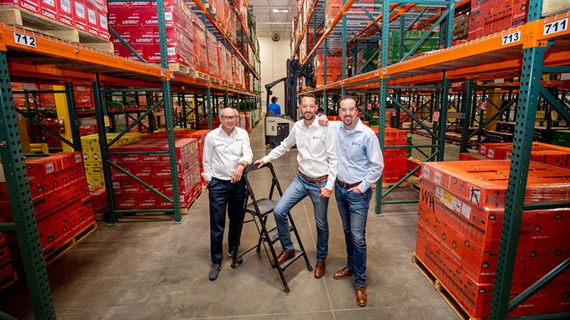 Family business owners in warehouse